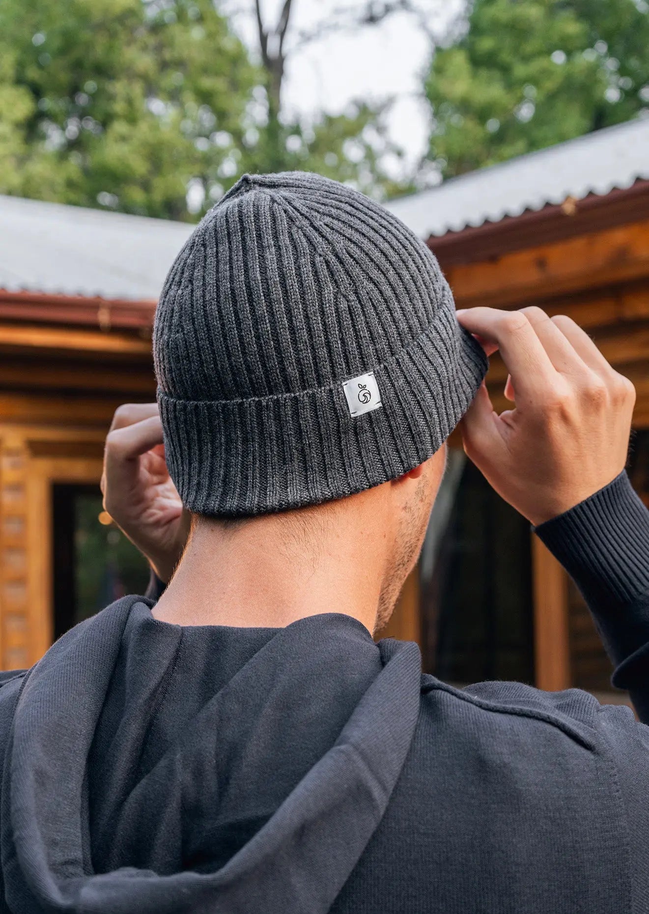 Man sporting a Unisex Brooklyn Beanie in dark gray (basalt)