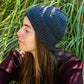 Woman outdoors wearing a Unisex Brooklyn Beaniein dark gray (basalt)