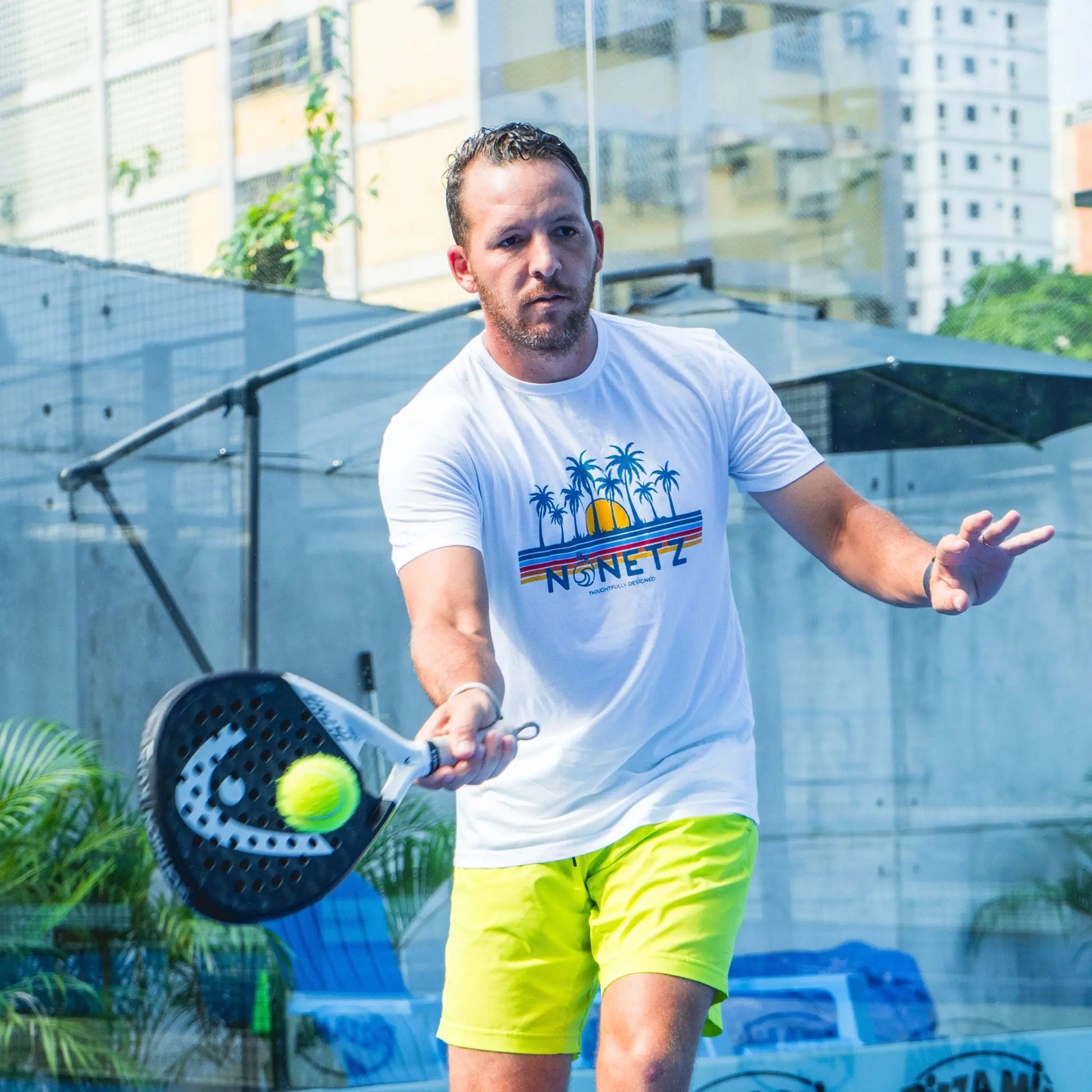 Man playing paddleball